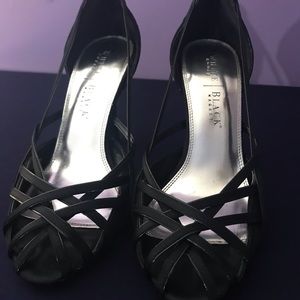 White House Black Market Size 8 black satin shoes.  Used without a box.